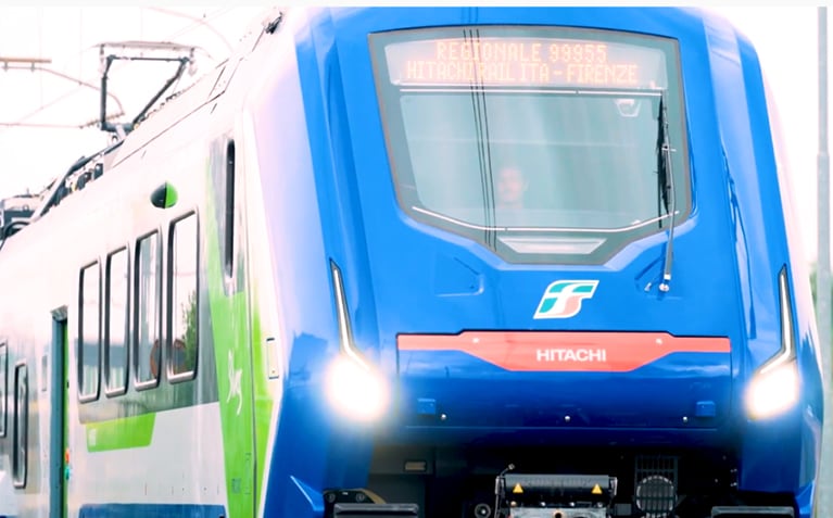 Achieving a 50% Reduction in CO₂ Emissions with Tribrid Trains